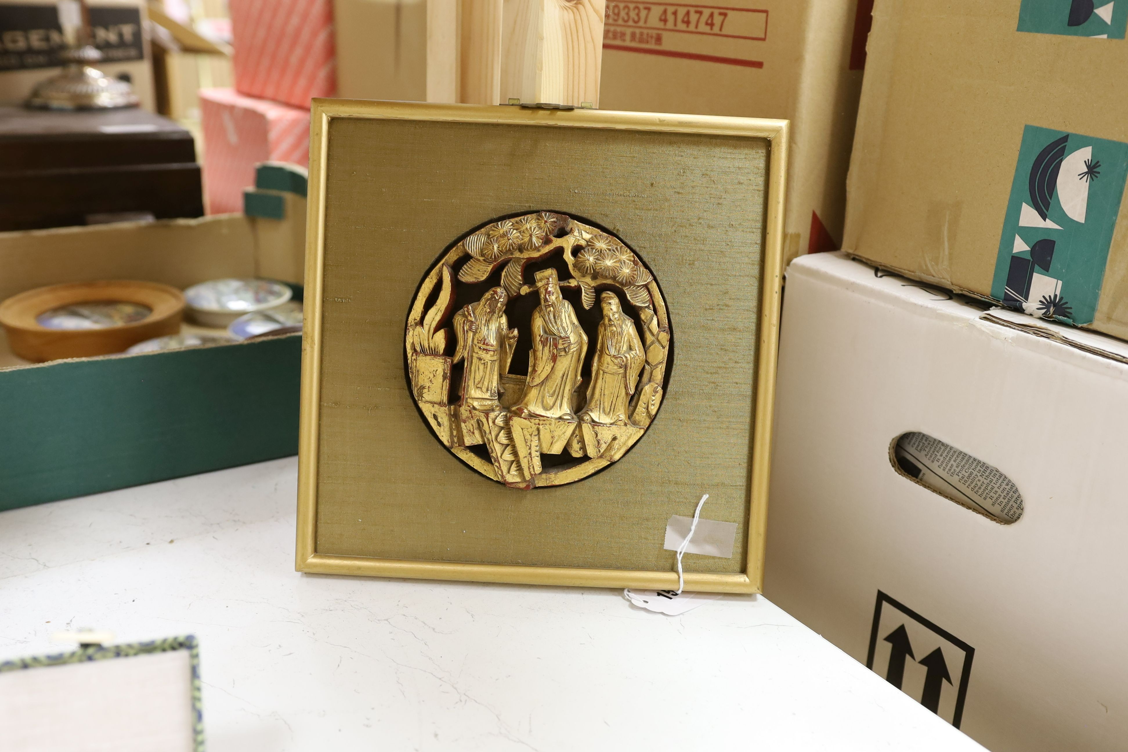 Two Chinese carved gilt wooden panels, a cased set of chopsticks, a boxed silk woven scroll and lacquer mahjong stands, a hand scroll and silk embroidery